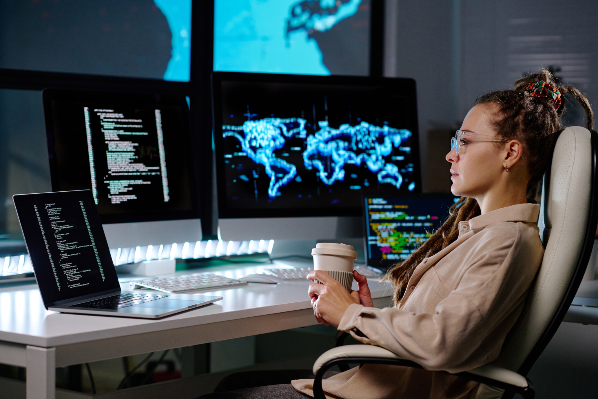 young-serious-businesswoman-with-cup-of-coffee-sit-2023-04-04-18-48-03-utc